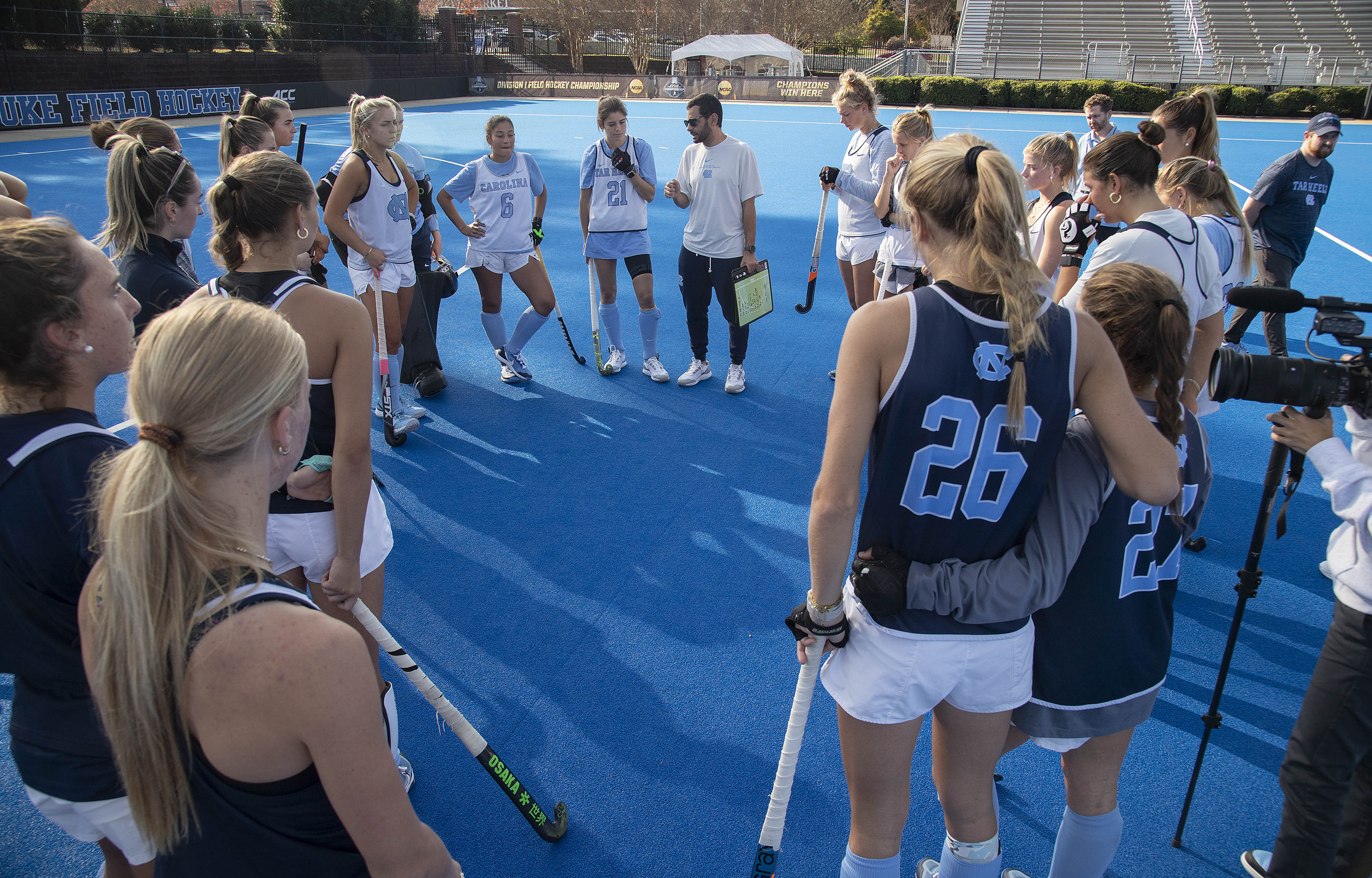 Caroline in a team huddle at the Final Four